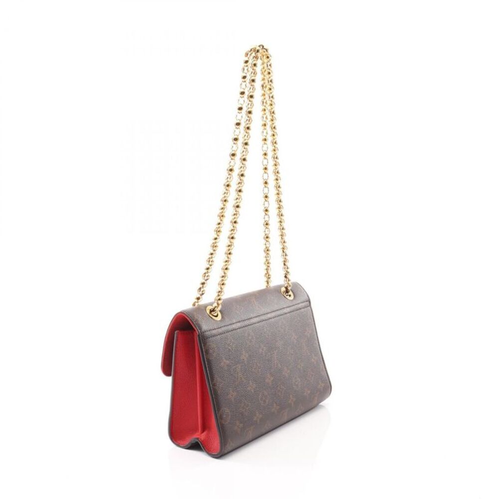 Louis Vuitton Victoire Monogram Shoulder Bag - Picture 4 of 10